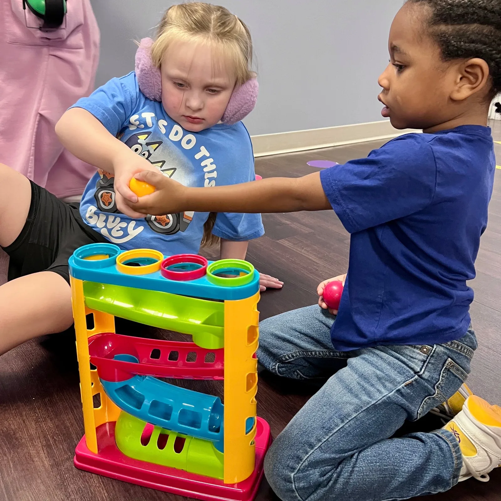 Two children playing music together